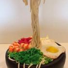 بالصور.. كعكات لذيذة تتحدى الجاذبية