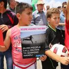 النبي صالح: نشطاء يرفعون البطاقات الحمراء دعما  لوقف عضوية الاحتلال في الفيفا