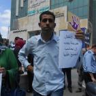 بالصور... وقفة لمكافحة عمالة الأطفال في الخليل