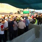 بالصور: حاجز قلنديا صباح الجمعة الأخيرة من شهر رمضان