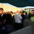 بالصور: حاجز قلنديا صباح الجمعة الأخيرة من شهر رمضان