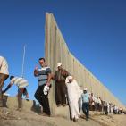 بالصور: حاجز قلنديا صباح الجمعة الأخيرة من شهر رمضان