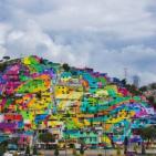 بالصور ـ فنانون مكسيكيون يحوّلون حياً شعبياً إلى لوحة ملوّنة!