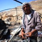 بالصور: مستوطنون يحرقون خيمة في عين سامية شرقي كفر مالك في رام الله والبيرة