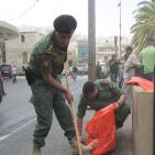 اﻻجهزه اﻻمنيه في نابلس  تشارك يوم حمله النظافة العالمي في نابلس