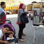 الساحر  مع الاطفال  في سوق الحرجة في رام الله