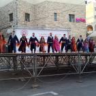 فرقة الهدف للدبكة  الشعبية و فرقة كنعان للتراث والفنون الشعبية في سوق الحرجة رام الله