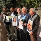 بالصور: مسيرة تطالب بالافراج عن جثاميين الشهداء المقدسيين