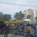 مسلحون يغلقون مدخل قلنديا مطالبين بتسليم جثمان الشهيدة عواد