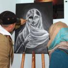 صور.. افتتاح معرض فني بغزة لمناهضة العنف ضد المرأة