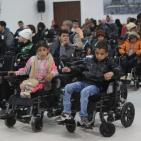 بحضور الرئيس مؤسسة التعاون والتنسيق التركي (تيكا) تسلم 50 فلسطينيا من ذوي الاحتياجات الخاصة كراسي كهربائية