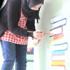 النجاح التطوعية والخدمة المجتمعية في النجاح يُنظمان نشاط رسم في إحدى المدارس