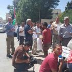 صور: نقابات العمال تحتج امام المحكمة برام الله رفضا لقرار تجميد اموالها