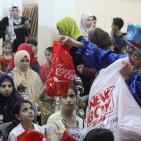 المشروبات الوطنية كوكاكولا/ كابي وراية اف ام  يعيدان على أيتام الجمعية الخيرية الاسلامية بالخليل