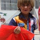 المشروبات الوطنية كوكاكولا/ كابي وراية اف ام  يعيدان على أيتام الجمعية الخيرية الاسلامية بالخليل