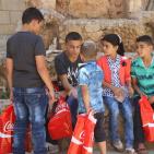 المشروبات الوطنية كوكاكولا/ كابي وراية اف ام  يعيدان على أيتام الجمعية الخيرية الاسلامية بالخليل