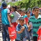 المشروبات الوطنية كوكاكولا/ كابي وراية اف ام  يعيدان على أيتام الجمعية الخيرية الاسلامية بالخليل