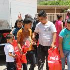 المشروبات الوطنية كوكاكولا/ كابي وراية اف ام  يعيدان على أيتام الجمعية الخيرية الاسلامية بالخليل