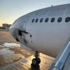 صور: تضرر طائرة مدنية جراء قصف طال مجمع مطار بغداد
