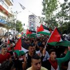 بالصور: مسيرة أعلام فلسطينية وسط رام الله إسنادا لأهلنا في القدس