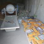 بالصور: ضبط مخزن يحوي مواد مغشوشة ومزورة في نابلس