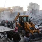 بالصور: 10 وفيات جراء انهيار مبنى سكني في حلب