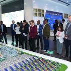 عواد يؤكد أهمية الاستفادة من التجربة الصينية في التنمية