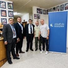 بنك الإسكان يتبرع بأجهزة الكترونية لجمعية بيت المسنين الخيرية في جنين