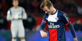 بالصور: بيكهام يودع الملاعب بدموع غزيرة وسط احتفالات باريس