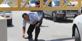 معاناة المواطنين على مداخل الخليل في ظل الطوق الأمني