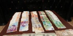 شرطة الخليل تضبط عملية مالية مزيفة