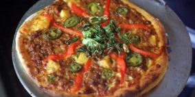 "صراف آلي" يقدم البيتزا عوضا عن النقود