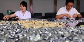 صيني ينتقم من قرار المحكمة بأكوام من العملة المعدنية