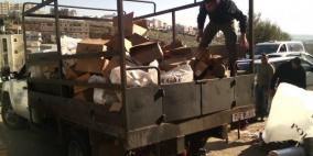 ضبط طن كريمات وزيت شعر منتهي الصلاحية في الخليل