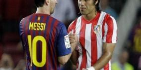 ميسي يتفوق على فالكاو ويقود برشلونة لعبور عقبة أتلتيكو