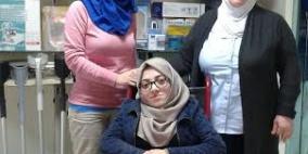 كرسي كهربائي لجامعية من ذوي الاحتياجات الخاصة بالخليل