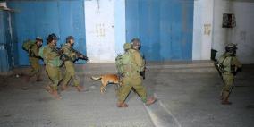 الاحتلال يعتقل 14 مواطنا