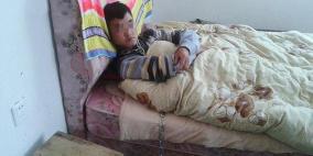 ربط عنق ابنه بسلاسل معدنية لإنقاذه من السجن