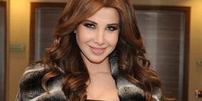 نانسي تؤجل حفلا لها وتعلن الحداد