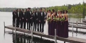 بالفيديو.. العروسان والمدعوون يسقطون في المياه