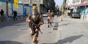 كتائب شهداء الأقصى تنظم عرض عسكري غرب غزة