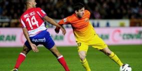 ثنائية ميسي تنقذ برشلونة من فخ غرناطة