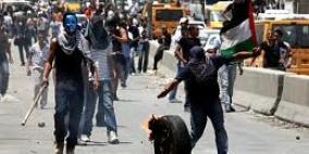 مواجهات قرب حاجز قلنديا عقب تشييع جثمان الشهيد عواد