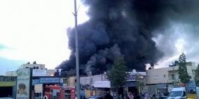 بالصور: حريق ضخم بأحد أسواق العيزرية شرق القدس