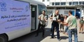 خيرية محمد بن راشد تقدم الاف وجبات الطعام على مدارس الايواء في قطاع غزة