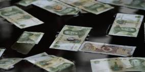 الصين تخفض سعر صرف اليوان