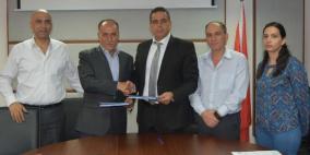 البديري يوقع اتفاقية لتطوير نظام مالي محوسب جديد للبلديات مع شركة أنظمة الغسان