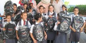 المشروبات الوطنية كوكاكولا/كابي توزع اكثر من 5000 حقيبة مدرسية