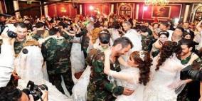 سلاف فواخرجي تحضر عرسا جماعيا لـ 20 عسكريا في الجيش العربي السوري