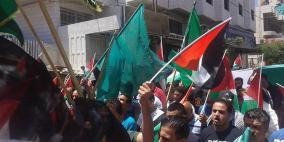 المئات يشاركون في مسيرة داعمة لغزة بالخليل